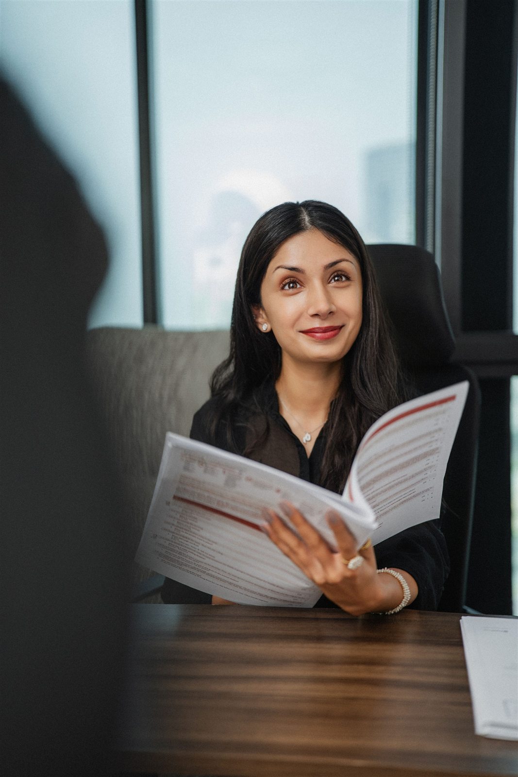 Career counsellor reviewing guidance materials