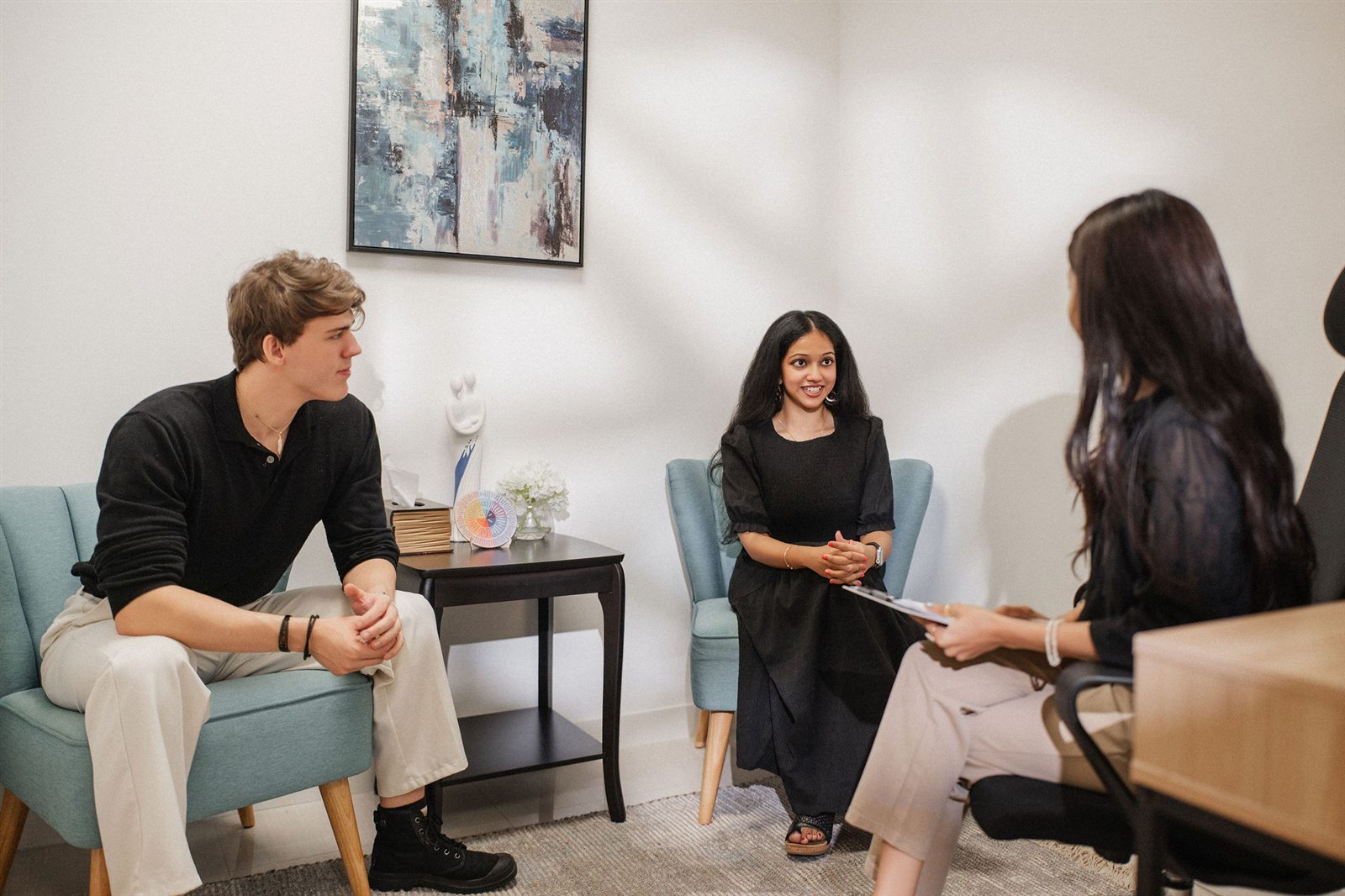 Students discussing their next steps at WellnessHub
